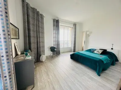 Un ou plusieurs lits dans un hébergement de l'établissement Appartement Roi Albert