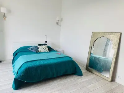 Un ou plusieurs lits dans un hébergement de l'établissement Appartement Roi Albert