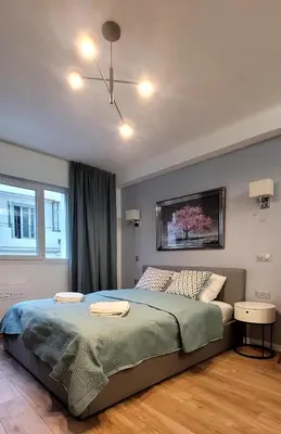 Un ou plusieurs lits dans un hébergement de l'établissement Cozy studio in the heart of Cannes