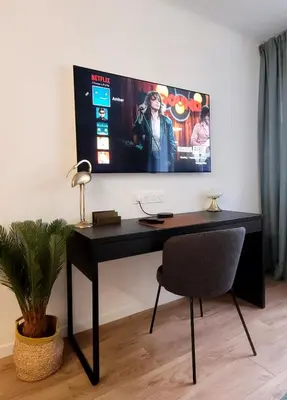 Télévision ou salle de divertissement dans l'établissement Cozy studio in the heart of Cannes