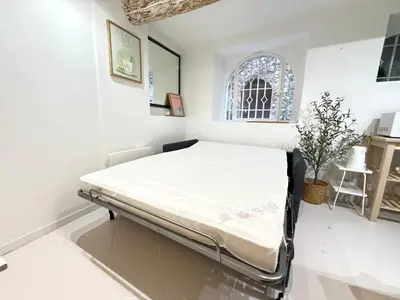 Un ou plusieurs lits dans un hébergement de l'établissement NEW - Studio Vieil Antibes - Les Remparts