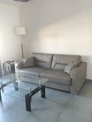 Coin salon dans l'établissement suite unique