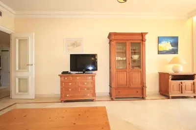 Télévision ou salle de divertissement dans l'établissement Palais Napoléon
