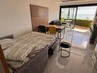 Un ou plusieurs lits dans un hébergement de l'établissement Vue mer exceptionnelle plage parking