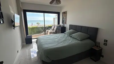 Un ou plusieurs lits dans un hébergement de l'établissement Vue mer exceptionnelle plage parking