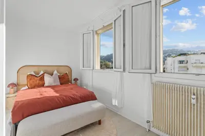 Un ou plusieurs lits dans un hébergement de l'établissement Appartement à Cannes