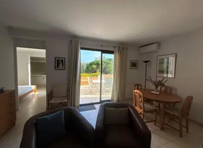 Coin salon dans l'établissement Appartement Hauts de Vaugrenier
