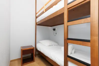 Un ou plusieurs lits dans un hébergement de l'établissement LERINS Appartement rénové Idéal famille Plages de juan les Pins à 200m Tout confort & parking