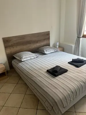 Un ou plusieurs lits dans un hébergement de l'établissement 2 rooms, old town