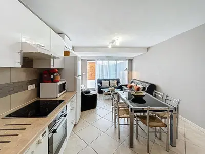 Cuisine ou kitchenette dans l'établissement L'Illette