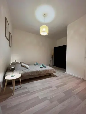Un ou plusieurs lits dans un hébergement de l'établissement Cozy Apartment Old Antibes