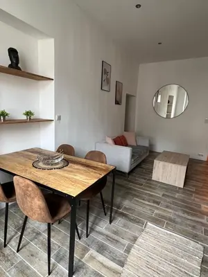 Coin salon dans l'établissement Cozy Apartment Old Antibes