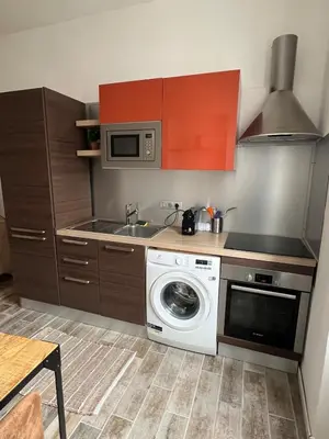 Cuisine ou kitchenette dans l'établissement Cozy Apartment Old Antibes