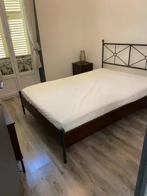 Un ou plusieurs lits dans un hébergement de l'établissement Appartement au cœur du Vieil Antibes