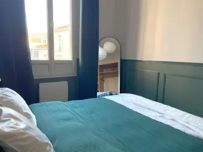 Un ou plusieurs lits dans un hébergement de l'établissement Charmant 2P avec Balcon, Proche Centre