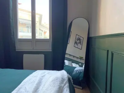 Un ou plusieurs lits dans un hébergement de l'établissement Charmant 2P avec Balcon, Proche Centre