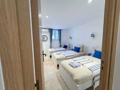 Un ou plusieurs lits dans un hébergement de l'établissement Grand appartement rénové - Jardin et Parking - CZ