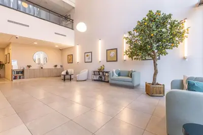 Coin salon dans l'établissement Zenao Appart'hôtels Villeneuve Loubet