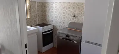 Cuisine ou kitchenette dans l'établissement Charme de la Mer