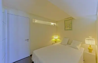 Un ou plusieurs lits dans un hébergement de l'établissement Luxueux 3 Chambres Terrasse de 90m hypercentre - Wifi Clim - 6 pers