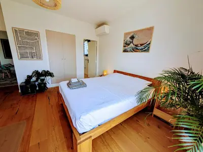 Un ou plusieurs lits dans un hébergement de l'établissement Villa Mona 