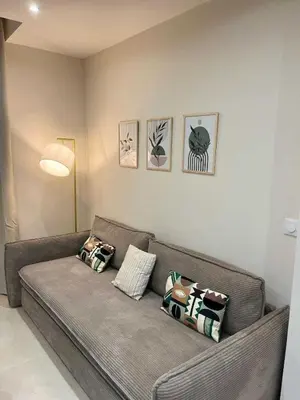 Coin salon dans l'établissement Modern apartment -2BDR 6P - 300m from the BEACH