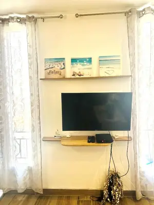 Télévision ou salle de divertissement dans l'établissement Casa Blue Azur - Juan Les Pins
