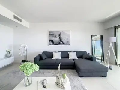 Coin salon dans l'établissement Appartement Vue mer