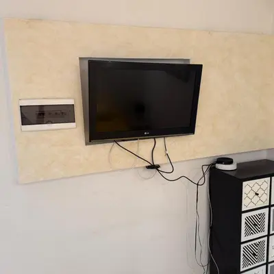Télévision ou salle de divertissement dans l'établissement Appartement Vue sur la mer à 5 minutes des plages