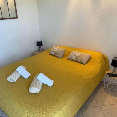 Un ou plusieurs lits dans un hébergement de l'établissement Appartement Vue sur la mer à 5 minutes des plages
