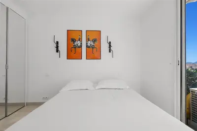 Un ou plusieurs lits dans un hébergement de l'établissement REF 1996 Cannes Croisette - Sea view apartment for rent