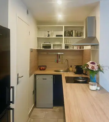 Cuisine ou kitchenette dans l'établissement App 4 pers avec terrasse