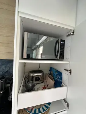 Cuisine ou kitchenette dans l'établissement Villeneuve Loubet - Proximité Marina Baie des Anges - Front de Mer - Parking privé