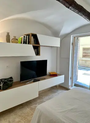 Télévision ou salle de divertissement dans l'établissement Riviera Cottage