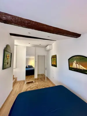 Un ou plusieurs lits dans un hébergement de l'établissement Riviera Cottage