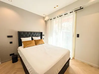 Un ou plusieurs lits dans un hébergement de l'établissement GRAY DUBOY D'ANGERS Luxury 3 bedrooms Croisette