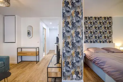 Un ou plusieurs lits dans un hébergement de l'établissement Antibes proche de la plage ,Appartement lumineux et climatisé