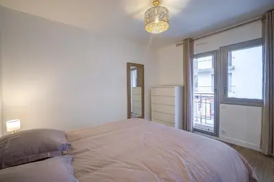 Un ou plusieurs lits dans un hébergement de l'établissement Antibes proche de la plage ,Appartement lumineux et climatisé