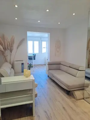 Coin salon dans l'établissement Charmant appartement cosy plage, gare, centre-ville