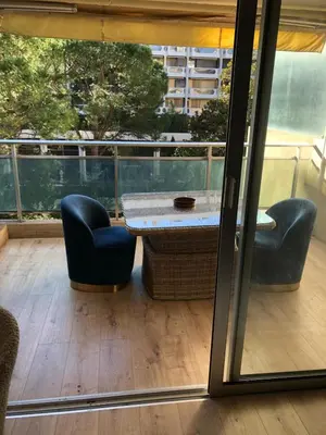 Coin salon dans l'établissement Studio terrasse Croisette