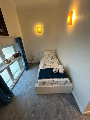 Un ou plusieurs lits dans un hébergement de l'établissement CANNES Vue Mer & Balcon dans Villa Exceptionnelle Belle Époque la Californie