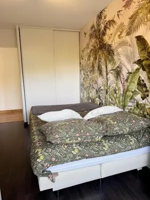 Un ou plusieurs lits dans un hébergement de l'établissement Apt with 2 bedrooms, terrace, pool & parking