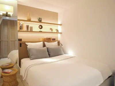 Un ou plusieurs lits dans un hébergement de l'établissement Beautiful apartment with panoramic sea view
