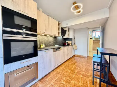 Cuisine ou kitchenette dans l'établissement Résidence Standing - Piscine - Vue mer