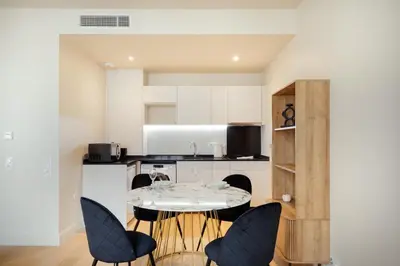 Cuisine ou kitchenette dans l'établissement Appartement Place de Gaulle - Welkeys