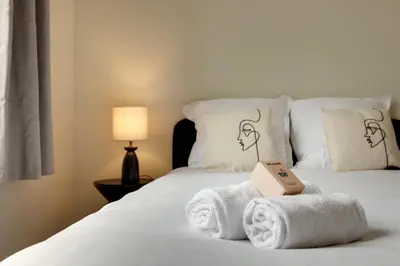 Un ou plusieurs lits dans un hébergement de l'établissement Appartement Place de Gaulle - Welkeys
