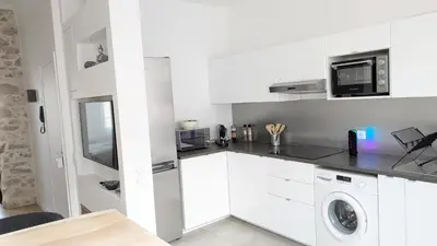 Cuisine ou kitchenette dans l'établissement cocooning # lumineux # Vieille ville