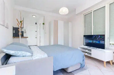 Un ou plusieurs lits dans un hébergement de l'établissement Le Léo - Terrasse, Parking, Piscine, Netflix