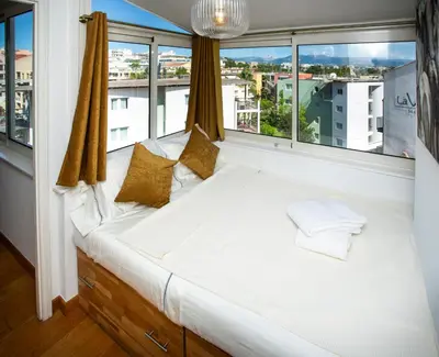 Un ou plusieurs lits dans un hébergement de l'établissement Penthouse apartment with panoramic views
