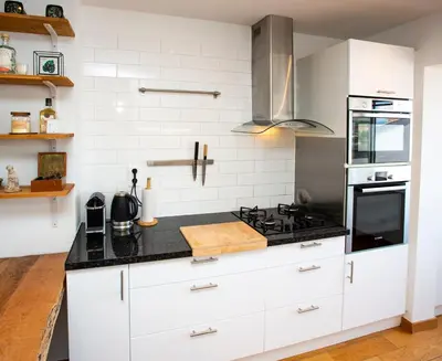 Cuisine ou kitchenette dans l'établissement Penthouse apartment with panoramic views